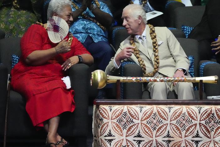 Britain's King Charles and Samoan Prime Minister Afioga Fiamē Naomi Mataʻafa, left, talk during the opening ceremony for the Commonwealth Heads of Government meeting in Apia, Samoa, Friday.