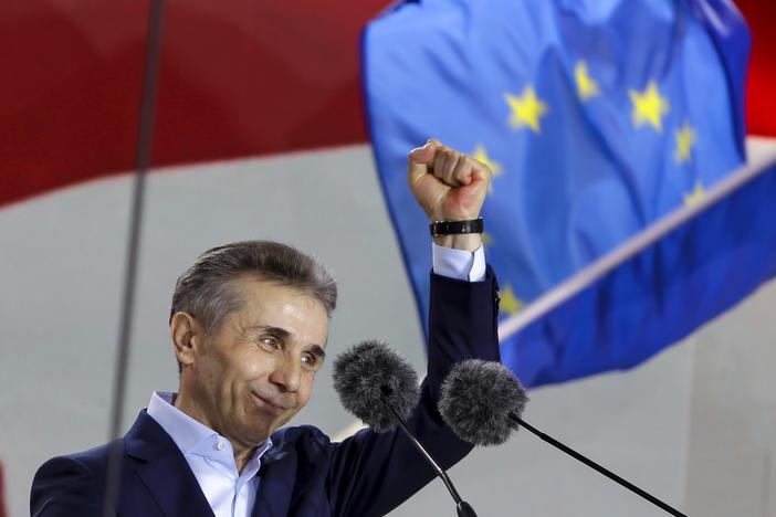 Billionaire Bidzina Ivanishvili, leader of the Georgian Dream party, greets demonstrators during a rally in Tbilisi, Georgia, on April 29.