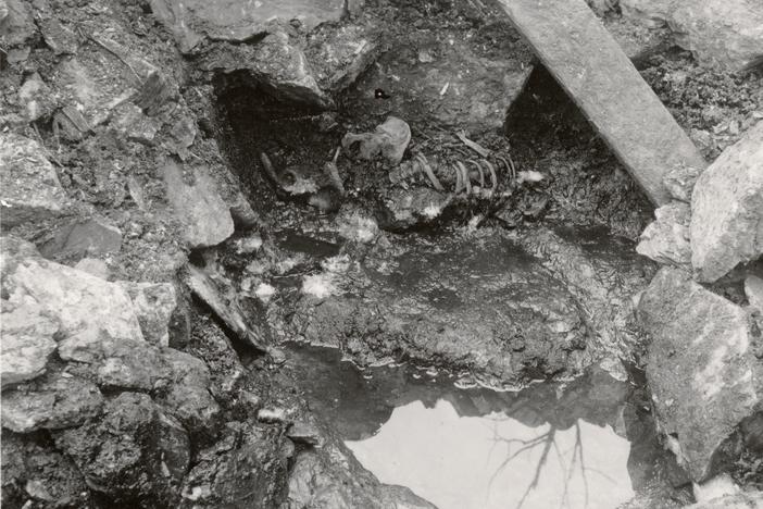 In 1938, a partial excavation of a well revealed a man’s skeleton — possibly that of a dead man thrown down the well in the 12th century.