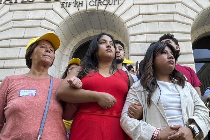 Supporters rally outside the 5th Circuit Court of Appeals in New Orleans on Thursday, Oct. 10, 2024, following a hearing on the future of the Deferred Action for Childhood Arrivals program. A separate lawsuit, filed in a federal district court in North Dakota, challenges a rule allowing DACA recipients to enroll in Affordable Care Act plans this year.