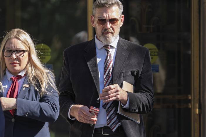 Actor Jay Johnston emerges from the U.S. District Courthouse in Washington, Monday, Oct. 28, 2024, after being sentenced to one year in prison for his part in a mob’s attack on the U.S. Capitol nearly four years ago.
