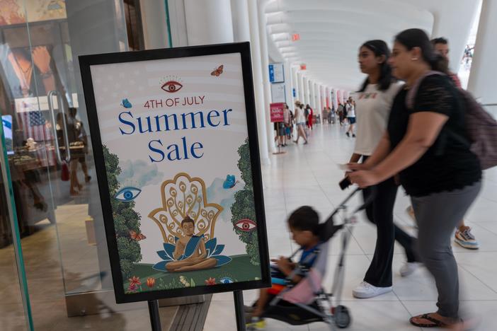 People walk through a mall in Manhattan on July 5, 2024. The economy grew an annual rate of 2.8% in the July to September quarter, a solid pace of expansion.
