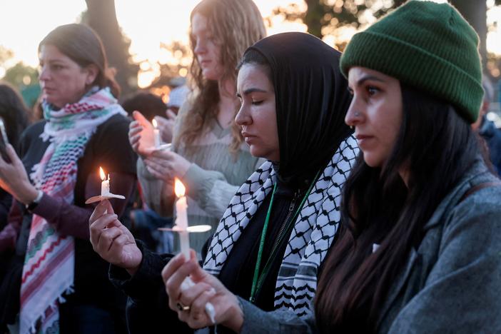 Pro-Palestinian supporters hold a candlelight vigil in Dearborn, Mich., on the first anniversary of the Oct. 7 Hamas-led attacks in Israel and the ongoing war in Gaza.