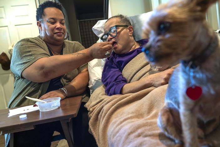 Dawn Shedrick, left, is one of roughly 106 million unpaid caregivers in the U.S. For 30 years, Shedrick taken care of her mother, Nathalia Shedrick, right, who has multiple sclerosis.