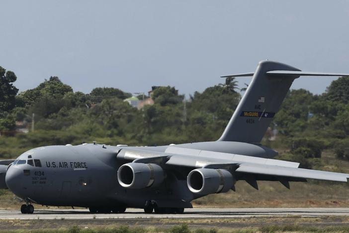 A United States Air Force C-17 cargo plane loaded with humanitarian aid lands at Camilo Daza airport in Cucuta, Colombia, on Feb. 16, 2019.