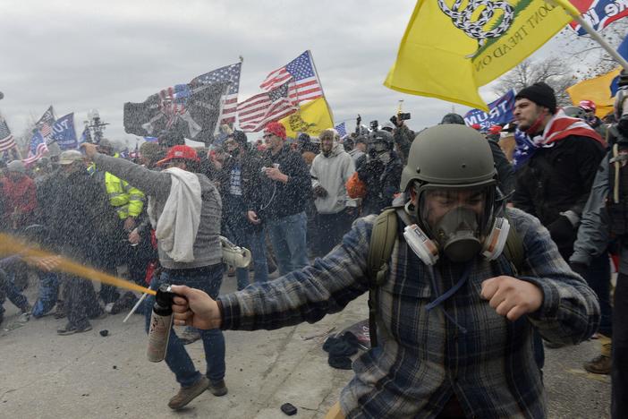 Trump supporters clash with police and security forces as people try to storm the U.S. Capitol Building in Washington, D.C., on Jan. 6, 2021.