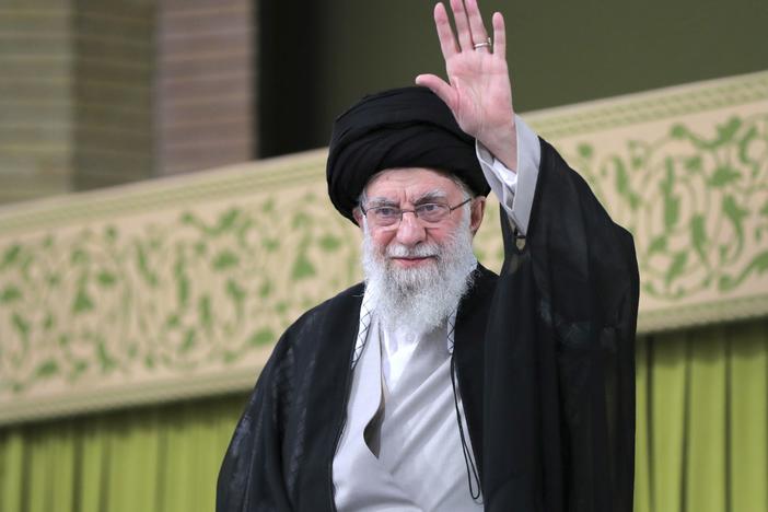 In this photo released by an official website of the office of the Iranian supreme leader, Supreme Leader Ayatollah Ali Khamenei waves to the crowd during a meeting with school and university students, in Tehran on Saturday.