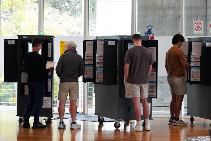 Voters cast their ballots on the last day of early voting for the 2024 election on Friday in Atlanta.
