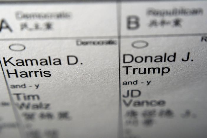 Candidates for president and vice president of the United States, Democrats Vice President Kamala Harris and Minnesota Gov. Tim Walz, and Republicans former President Donald Trump and Sen. JD Vance, R-Ohio, are seen on part of a mail-in election ballot in New York on Sunday.