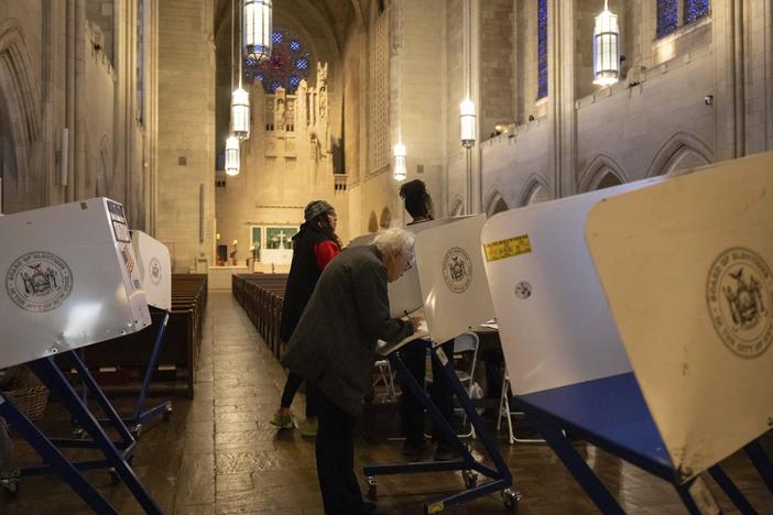 A voter casts a ballot at the Church of the Heavenly Rest in New York on Election Day, Tuesday, Nov. 5, 2024.