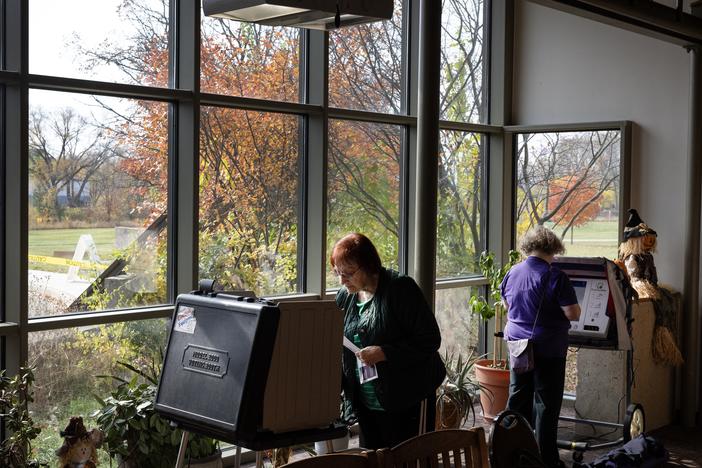 Residents cast in-person absentee ballots at a polling place set up at the Warner Park recreation center on October 30, 2024 in Madison, Wisconsin.