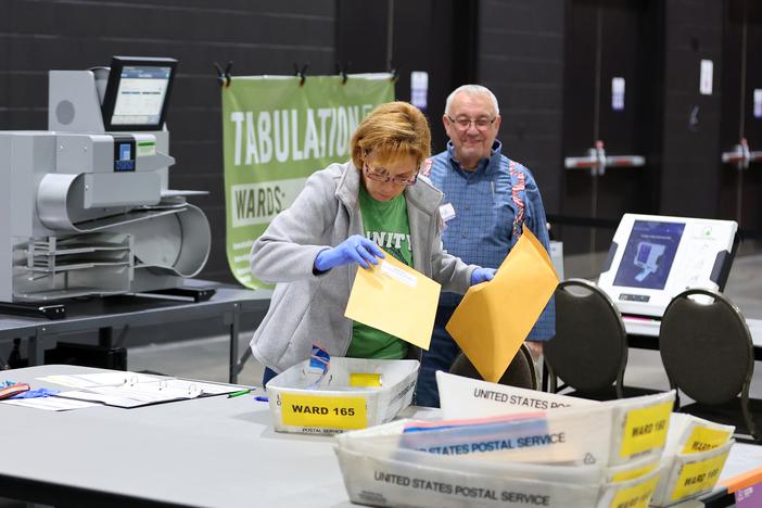 Workers count ballots at the Baird Center in Milwaukee, Wisconsin on Tuesday.