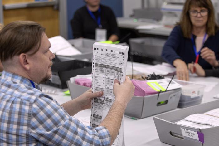 Election workers sort ballots last week at the Registrar of Voters Office in Reno, in Nevada's Washoe County.
