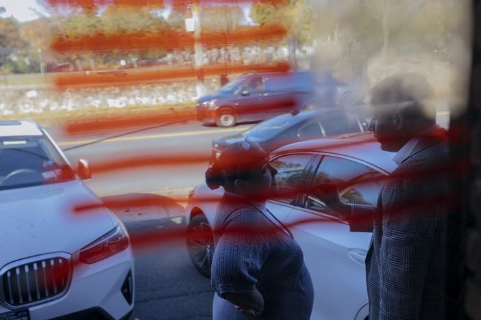 Republican supporters briefly chat outside the Staten Island Republican Party headquarters in the New Dorp neighborhood of Staten Island in New York City on Tuesday.