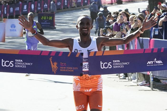 Abdi Nageeye of the Netherlands crosses the finish line to win the men's division during the New York Marathon in New York City on Sunday.