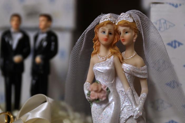 Same-sex marriage cake toppers are displayed on a shelf at Fantastico on December 5, 2017 in San Francisco, California. The U.S. Supreme Court is hearing a civil rights case over a Colorado baker's refusal to make a wedding cake for a same-sex couple.