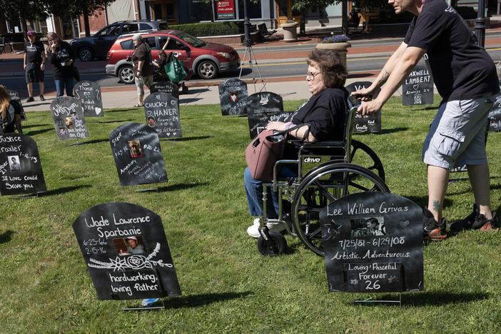 A public art memorial project honors victims of the opioid crisis in Binghamton, New York, in August 2023. Money from opioid lawsuit settlements is now flowing to states and municipalities, but the accounting is uneven.