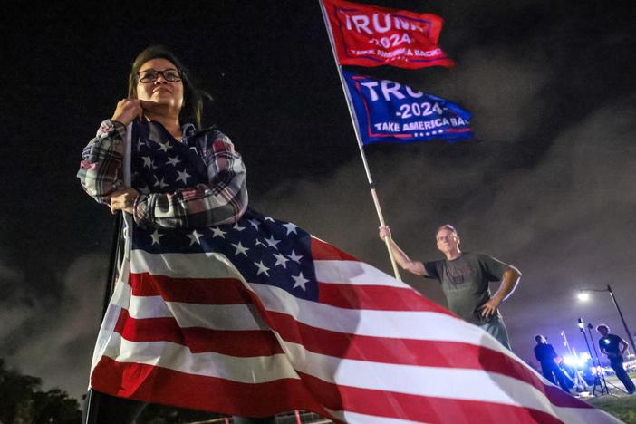 Supporters of Donald Trump gather near his Mar-a-Lago resort in Palm Beach, Florida, on Election Day.