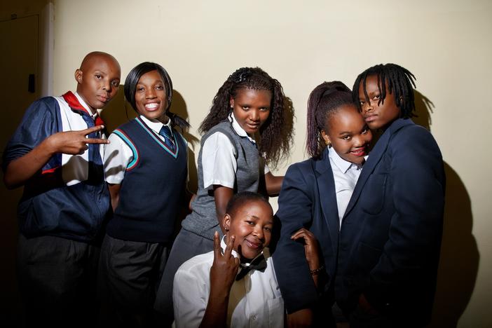 Ntombozuko 'Nozuko' Ndlwana (from left), Thozama, Nana, Zintle, Hlomela Msesele and Tsidi Zondi (in front) pose for a photo backstage during the Miss Lesbian beauty pageant in the Khayelitsha township of Cape Town, South Africa, in 2012.