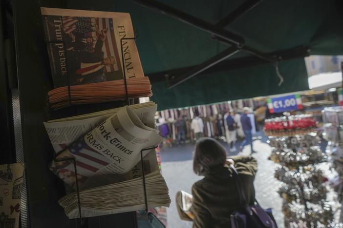 International newspapers report U.S. President-elect Donald Trump's election win, in central Rome on Thursday.