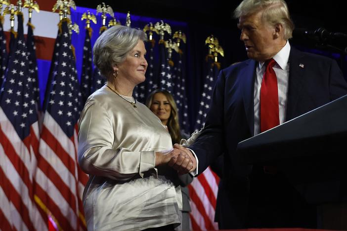 President-elect Donald Trump praises his campaign senior advisor Susie Wiles during an election night event at the Palm Beach Convention Center on Nov. 6 in West Palm Beach, Fla. Trump has asked Wiles to serve as his chief of staff when he takes office in January.