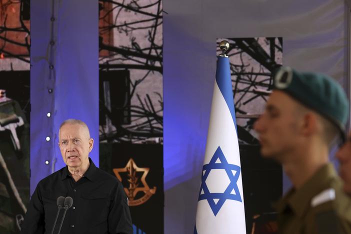 Israel's Defense Minister Yoav Gallant speaks during a ceremony marking the Hebrew calendar anniversary of the Hamas attack on October 7 last year that sparked the ongoing war in Gaza, at the Mount Herzl military cemetery in Jerusalem, Israel Sunday Oct. 27, 2024.