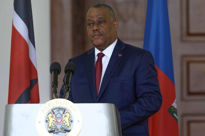 Haiti Prime Minister Garry Conille speaks during a joint press conference with Kenya's President William Ruto at the State House in Nairobi, Kenya, Oct. 11, 2024.