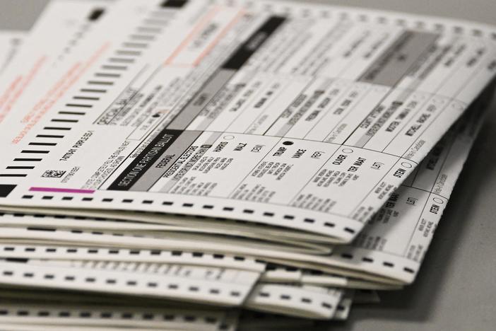 A ballot marked for Trump sits in a stack of voted ballots inside the Maricopa County Tabulation and Election Center (MCTEC) on Election Day, November 5, 2024 in Phoenix.