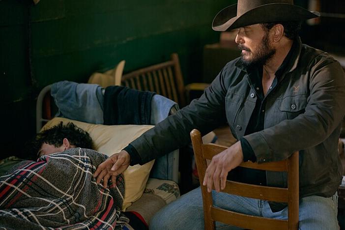 Finn Little as Carter and Cole Hauser as Rip Wheeler.