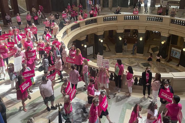 Abortion rights supporters are seen gathering for a "pink out" protest organized by Planned Parenthood in the rotunda of the Wisconsin Capitol, June 22, 2022, in Madison, Wis.