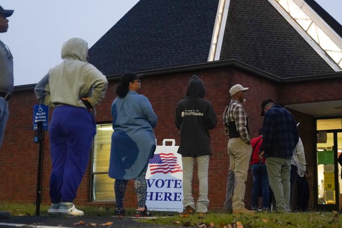 Voters line up to cast their ballots on Nov. 5, 2024 in Austell, Georgia. Intelligence officials and researchers say Russia, Iran, and China tried to influence Americans in this year's election. But there's no indication so far their efforts swayed results.