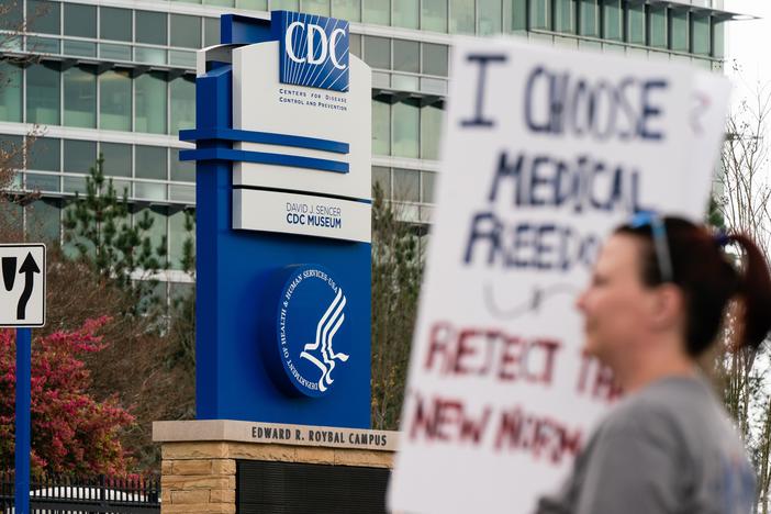 Protesters against masks, vaccines and vaccine passports march outside the headquarters of the Centers for Disease Control and Prevention in Atlanta in 2021.