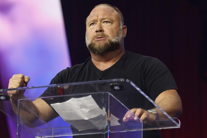 Conspiracy theorist and Infowars host Alex Jones, pictured in June, says even if his show and its parent company, Free Speech Systems, are shut down as a result of the auction, he will not be silenced.