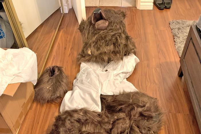 The California Department of Insurance says detectives found this bear costume at the home of the suspects accused of orchestrating fake bear attacks on their vehicles.