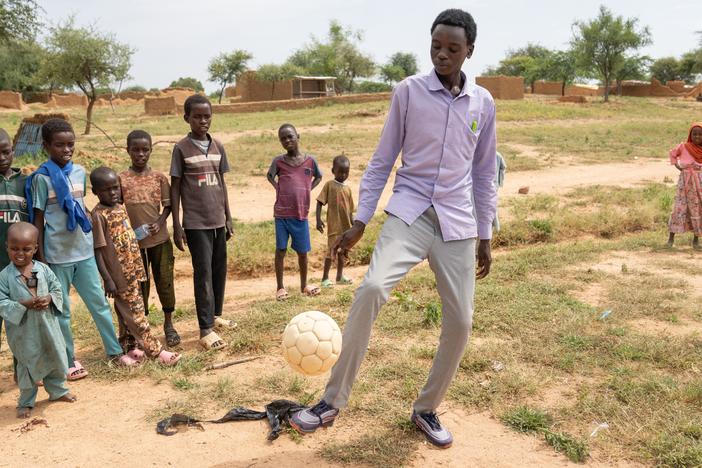Mahawat Zakaria Jouma is happy when he gets a chance to play soccer, but mostly he is busy taking care of his siblings, trying to earn money makeing bricks, and going to school.