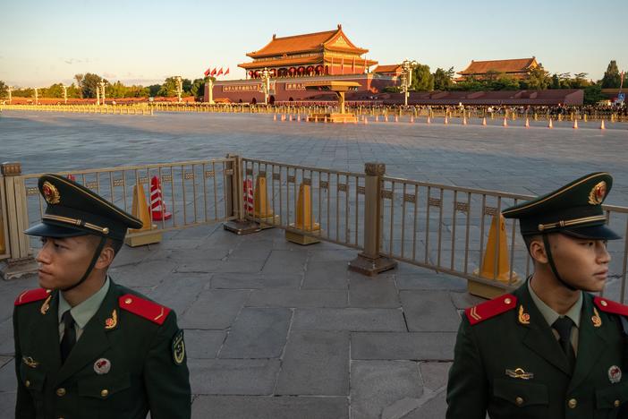 People's Liberation Army soldiers stand guard in Tiananmen Square at the end of the flag-raising ceremony marking the 75th anniversary of the founding of the People's Republic of China, in Beijing, on Oct. 1.