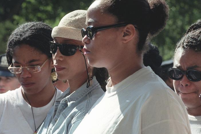 Malcolm X's daughters, Malikah Shabazz (from left), Attallah Shabazz, Malaak Shabazz and Gamilah Shabazz, talk to the media outside the Jacobi Medical Center in the Bronx borough of New York, following the death of their mother, Betty Shabazz on June 23, 1997. A new lawsuit accuses the CIA, FBI, the New York Police Department and others of playing roles in the 1965 assassination of the civil rights leader.