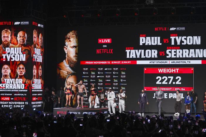 Jake Paul steps on the scale during a weigh-in ahead of his heavyweight bout against Mike Tyson, Thursday, Nov. 14 in Irving, Texas.