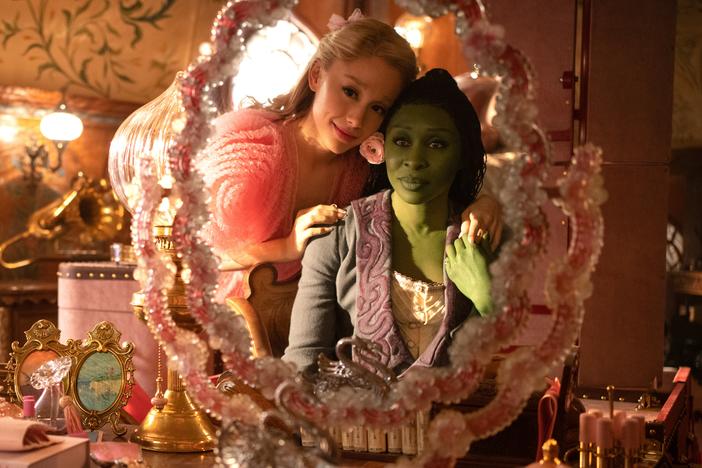 Galinda (Ariana Grande) and Elphaba (Cynthia Erivo) are opposites in every way, forced to room together at Shiz University.