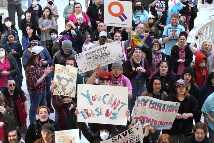 Trans-rights activists protest outside the House chamber at the Oklahoma state capitol before the State of the State address, Feb. 6, 2023, in Oklahoma City. Oklahoma and 25 other states have anti-trans laws on the books.