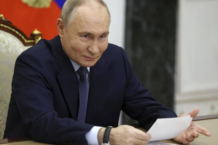 Russian President Vladimir Putin speaks during a meeting with the leadership of the Russian Ministry of Defense, representatives of the military-industrial complex and developers of missile systems at the Kremlin in Moscow on Friday.