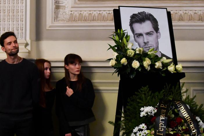 Mourners pay respects to late Russian ballet dancer Vladimir Shklyarov during a memorial service at the Mariinsky Theatre in Saint Petersburg on November 21, 2024.