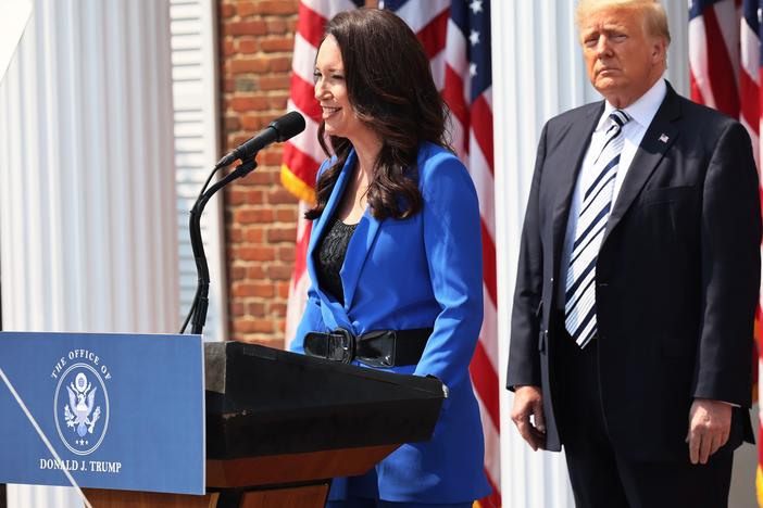 Brooke Rollins, president and CEO of America First Policy Institute, introduces former President Donald Trump during a press conference in July 2021 in Bedminster, N.J.