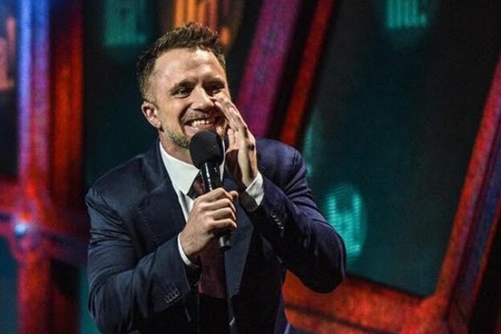 Stand-up comedian D.J. Demers is hard of hearing. To reach others in the deaf community, his shows often include a sign language interpreter. Jennifer Lees (left) has interpreted many of his shows.