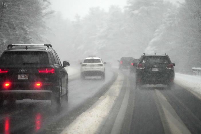Motorists on I-89 near Lebanon, N.H., deal with the first snowstorm of the season on Thursday.