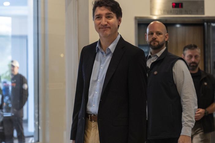 Canada Prime Minister Justin Trudeau walks through the lobby of the Delta Hotel by Marriott in West Palm Beach, Fla., on Saturday.