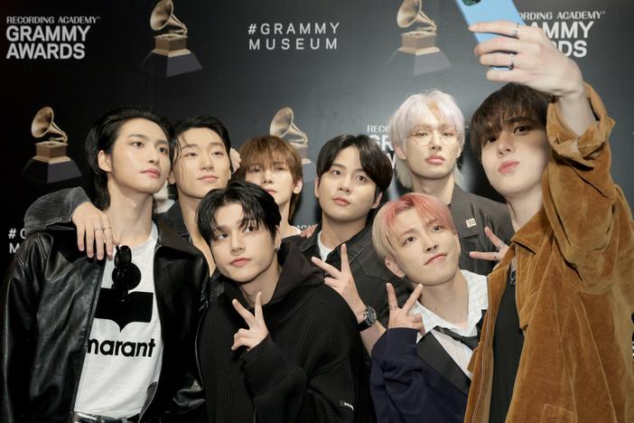 Members of the group ATEEZ pose in Los Angeles in April. In a little over two years, the K-pop group has released six new EPs that have reached the top 10 of <em>Billboard</em>'s album chart. The group's latest, <em>GOLDEN HOUR: Part.2</em>, debuted at No. 1 this week.