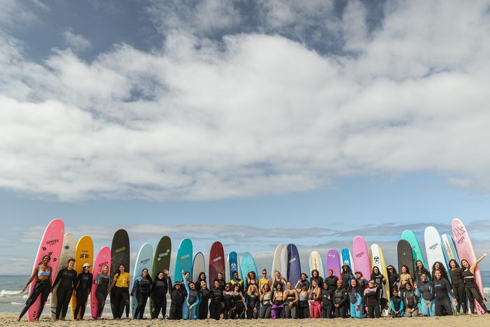 An effort called One More Hour, created by the Foundation for Social Connection and the dating app Hinge, invests in groups where people can find friends — like this surfing club for women of color in Los Angeles called Intrsxtn Surf.