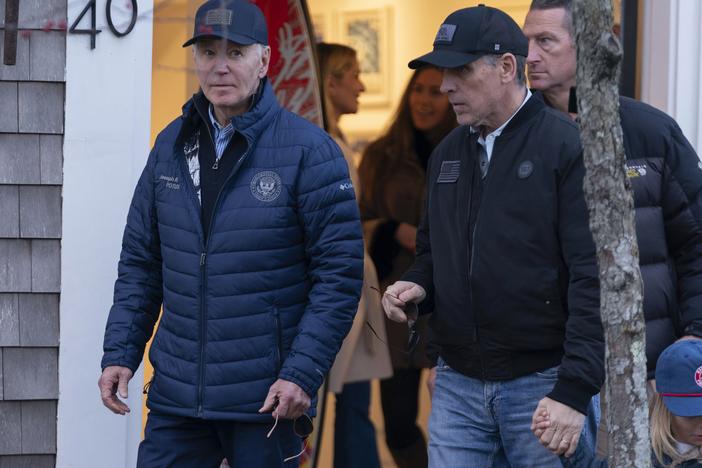 President Biden and his son Hunter Biden walk in downtown Nantucket, Mass., on Friday.