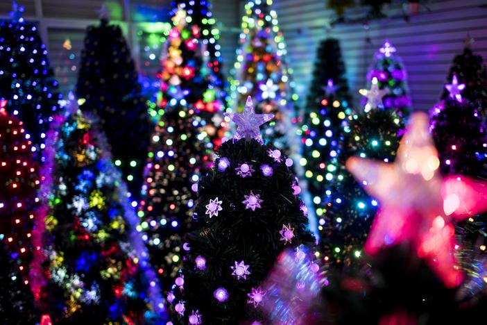 This picture taken on December 7, 2016 shows Christmas trees in a display room of Sun Xudan's artificial Christmas tree factory in Yiwu.